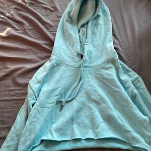 Cropped light blue sweatshirt